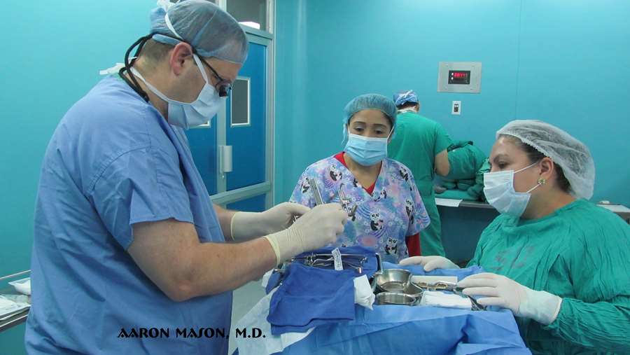 Dr. Aaron Mason performing surgery