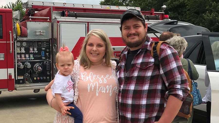 NICU Grad and her parents at Fire Truck
