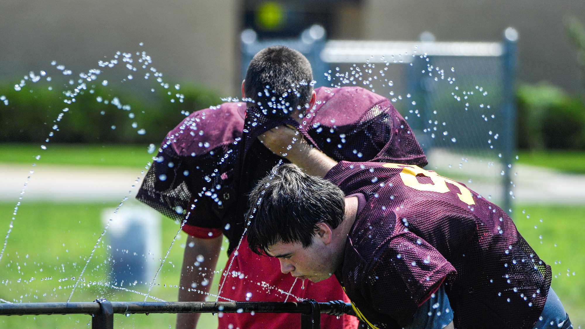 Student football players outside