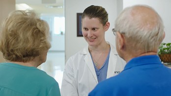 Dr. Sedney greeting patients