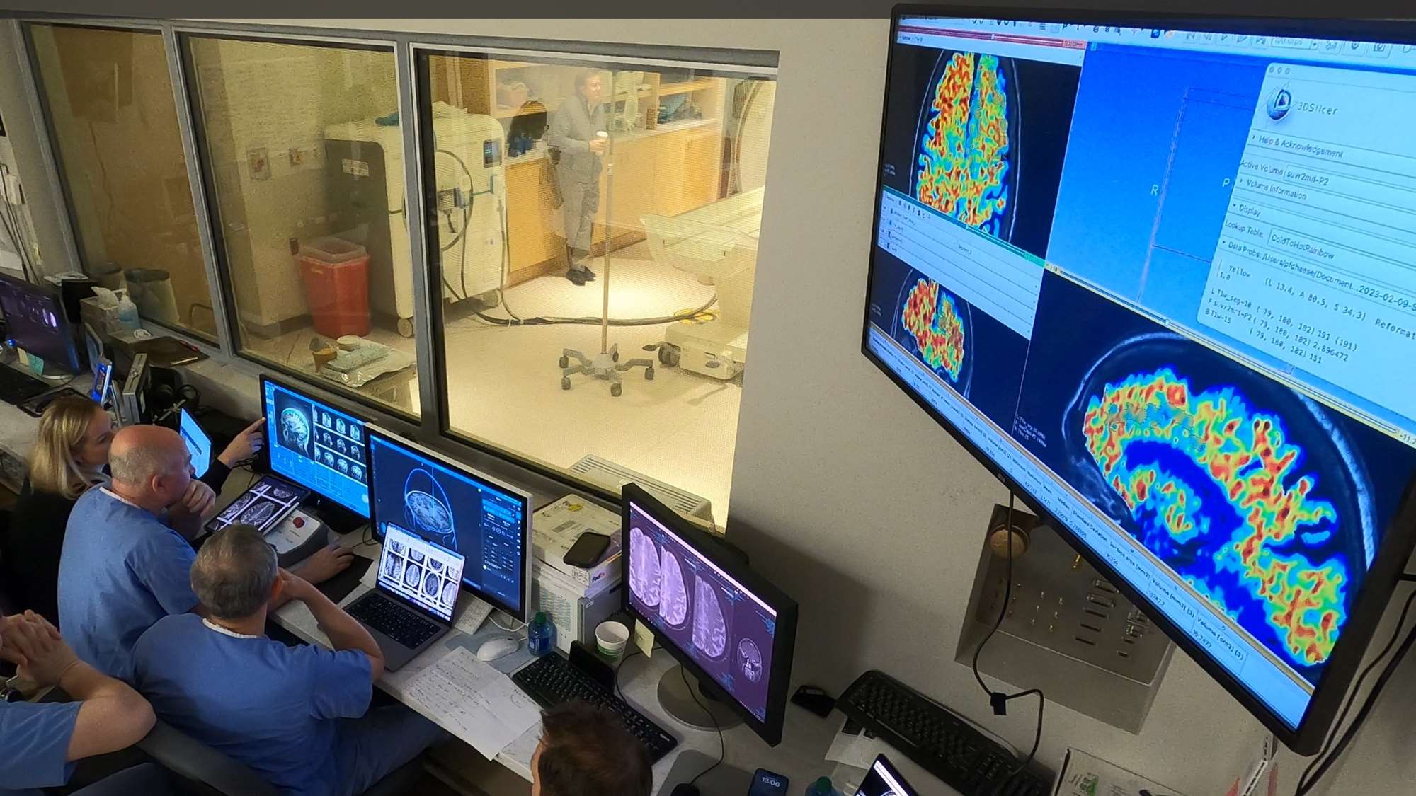 Several doctors remote controlling MRI machinery