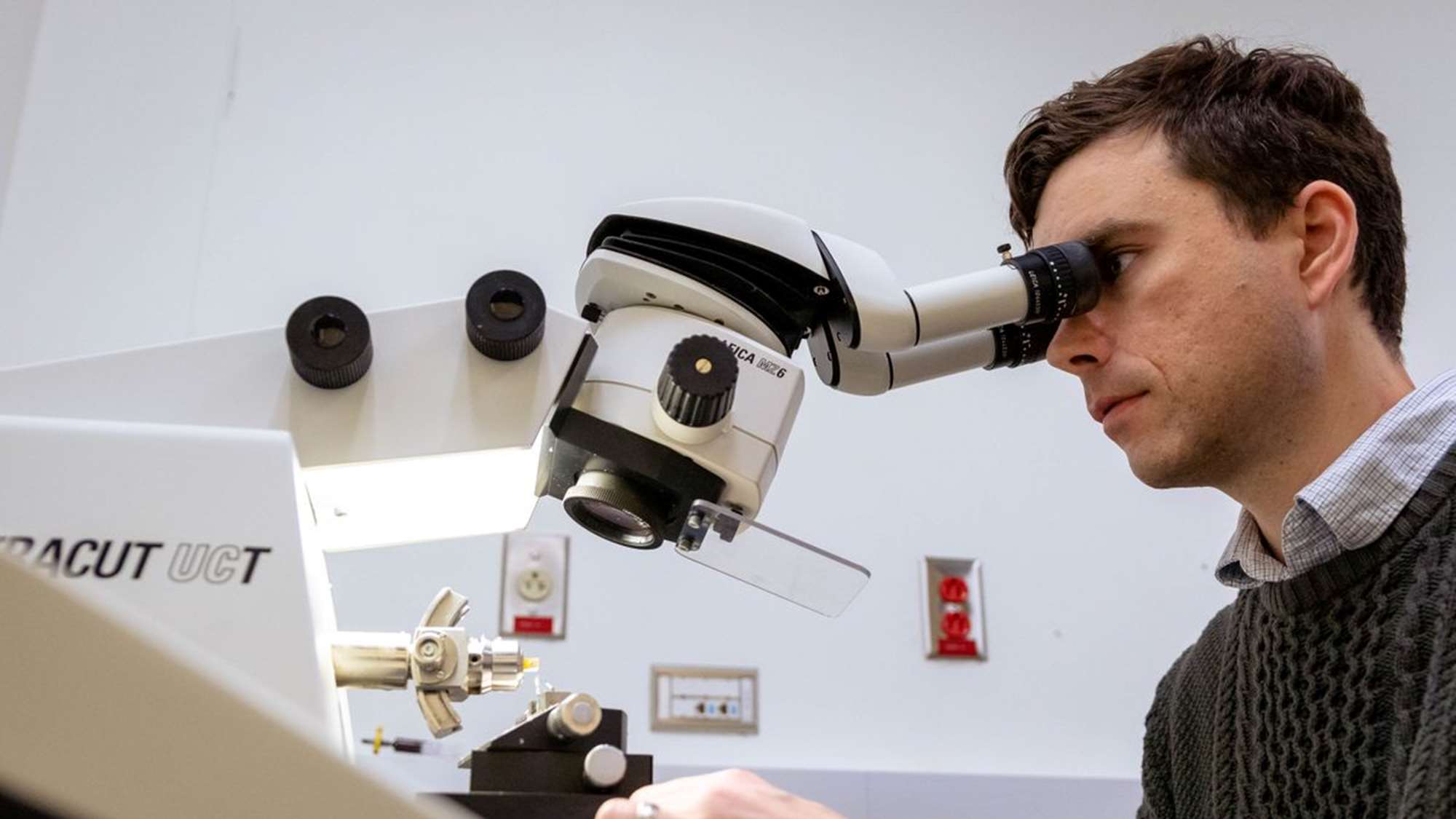 Doctor using a microscope