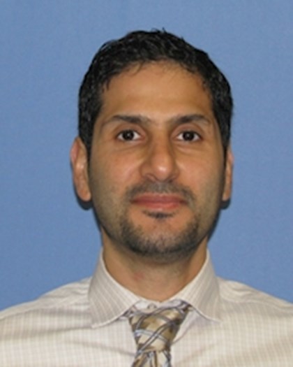 A head shot photo of Yasir Al-Azzawi, M.D..