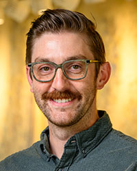 Headshot of Daniel Pustay.